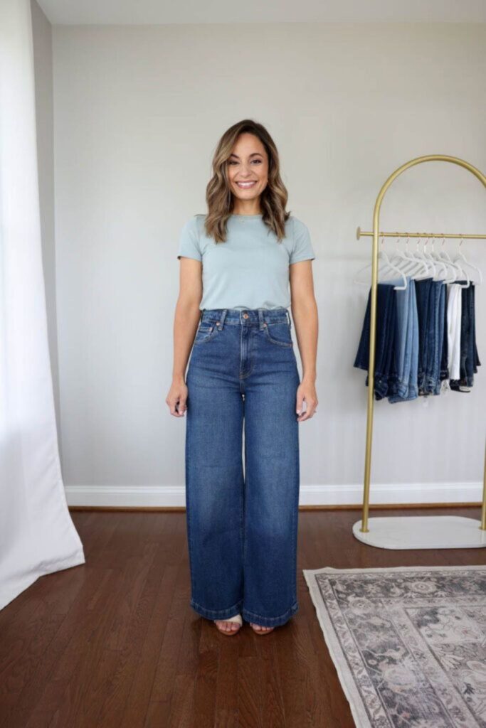 A Petite Woman Wearing A Wide-Leg Petite Jeans