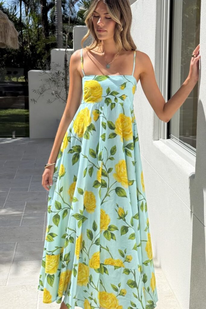 A Petite Woman Wearing An A-Line Maxi Dress