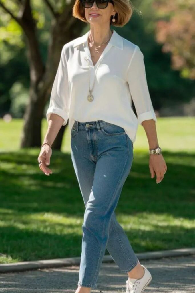 A Petite Woman Wearing Jean And Accessories