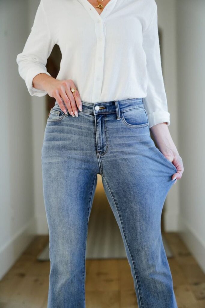 a lady checking her jeans