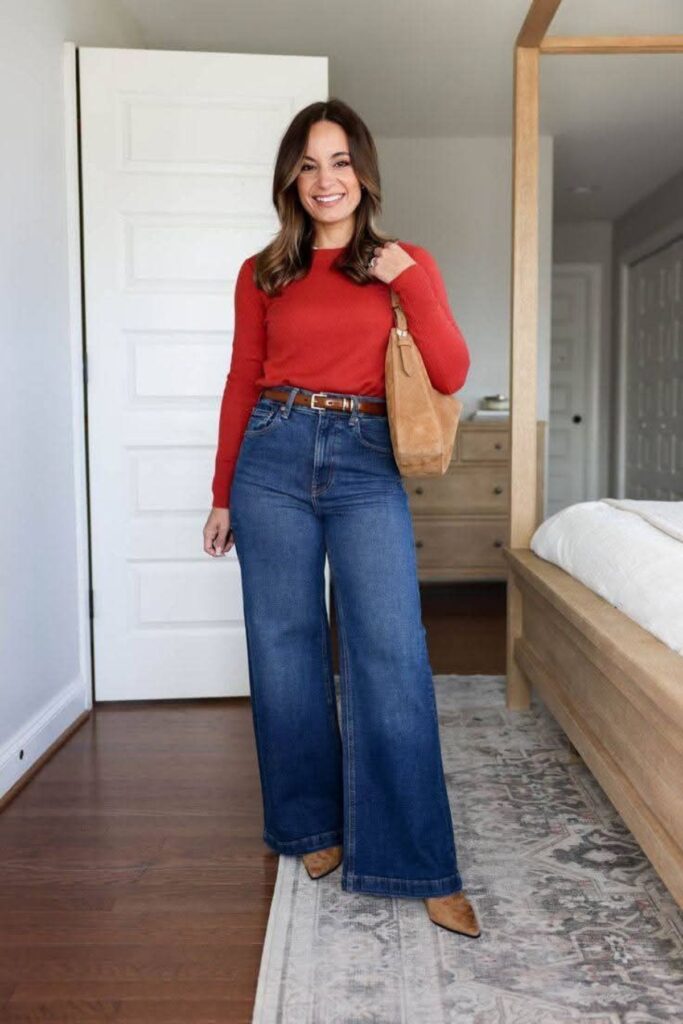 a petite lady wearing a Wide-Leg Jeans With A Fitted Sweater