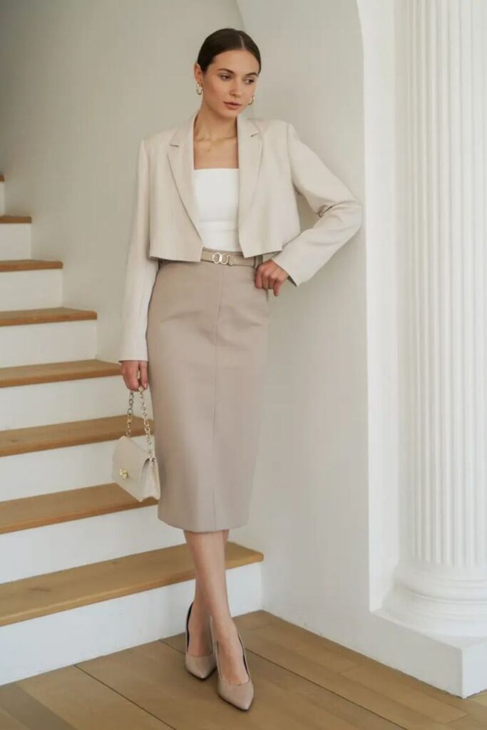 a petite woman wearing Cropped Suit Jacket And Slim Skirt