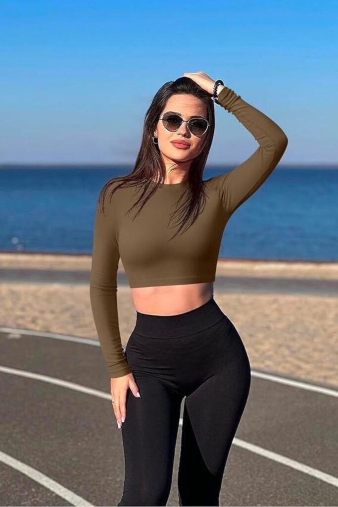 a petite woman wearing Cropped Long-Sleeve Workout Top