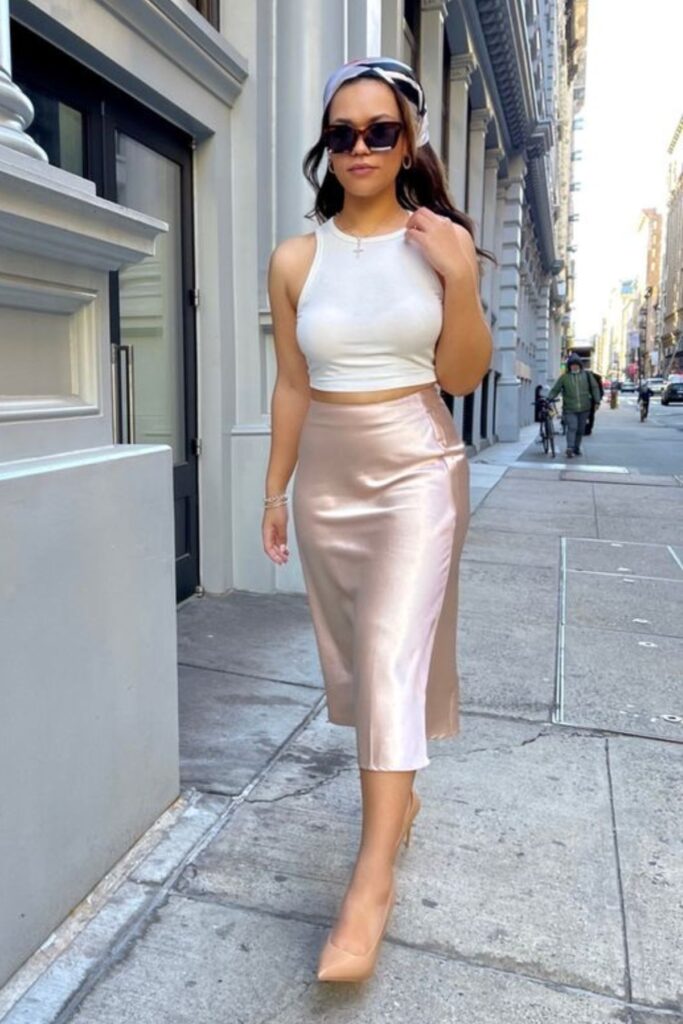 a petite woman wearing Ribbed Tank And Satin Skirt