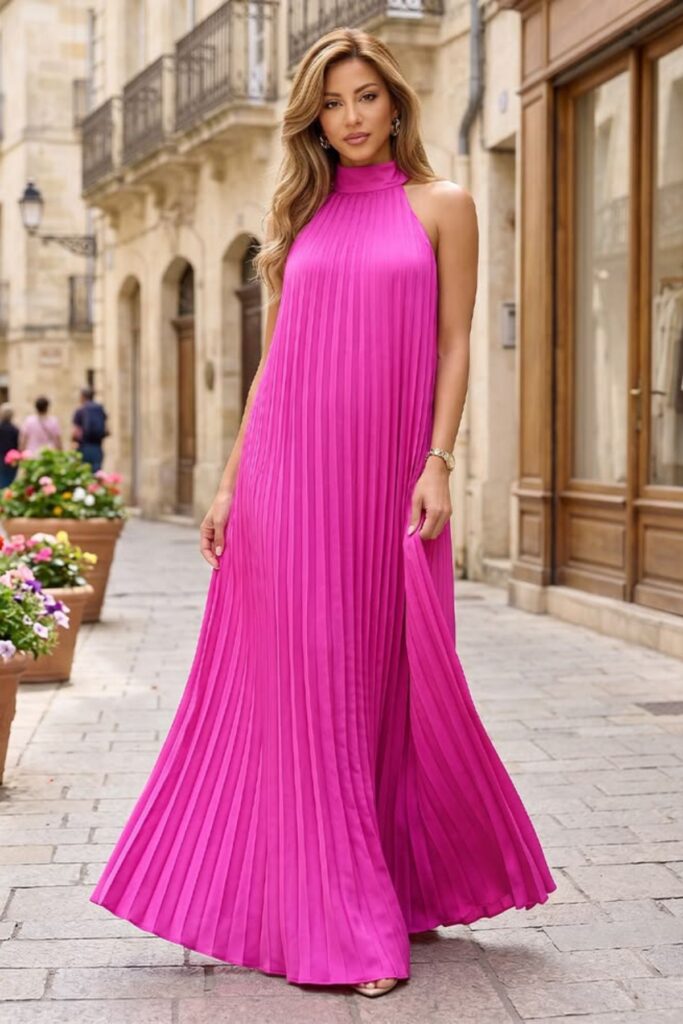 a petite woman wearing a Pleated Maxi Dress